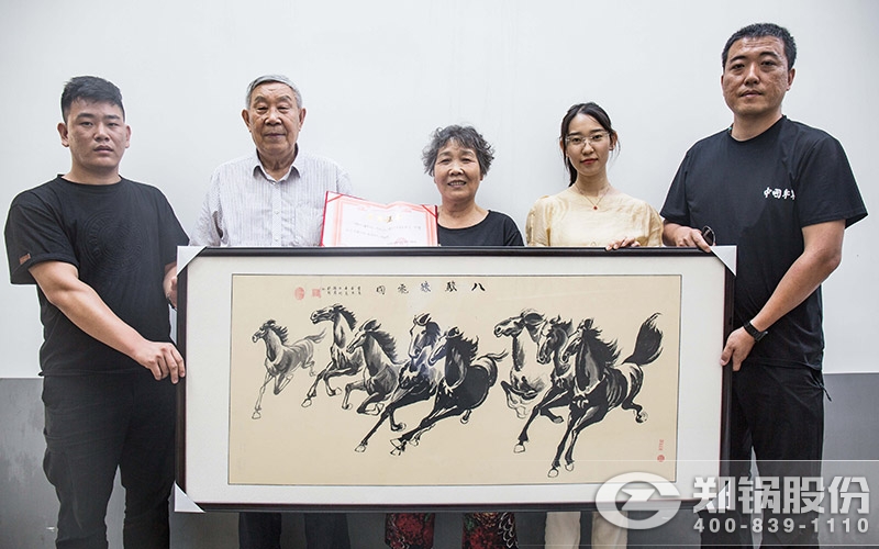 刘本立先生将其画作赠送给金百博